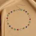 Detailed shot of silver heart-shaped gemstone necklace on silk fabric background - 2# Silver Heart Gemstone Necklace