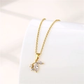 Detailed view of a gold-plated stainless steel leaf pendant with sparkling zircon crystals - Gold