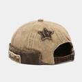 Detailed view of vintage washed docker hat featuring pentagram patch and side label - Adjustable / Khaki