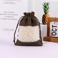 Dark brown linen drawstring pouch with transparent window and white pearls inside - Coffee