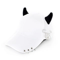 Detail of white baseball cap with black horns, silver rings, and star heart pendants - Safety Pin Heart White