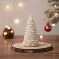 White Christmas tree scented candle on wood base, dimensions 9.5cm height by 5.7cm width - White Cedar Christmas Tree (Tuberose) / 5.7x9.5cm