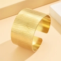 Vintage wide C-shaped stainless steel cuff bracelet with gold-plated wood grain texture - Gold