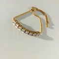 Elegant gold adjustable slider box chain bracelet featuring eight round clear zircons - Gold White Zirconia (SBK449)