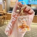 Portachiavi Capybara sabbie mobili caramello con paillettes a stella e cinturino morbido - Cinturino Arancione - Stile Mahjong con Animali dei Cartoni Animati