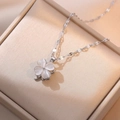 Silver titanium steel necklace with cat eye stone clover pendant in a beige jewelry box - Rotating Opal Necklace (X0129)