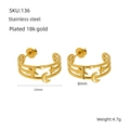 Detailed view of 18k gold plated stainless steel hoops with moon and star charms - Star Moon Hollow Design (ZE136G)