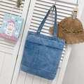 Classic washed blue denim tote bag with a front patch pocket and long shoulder straps - Style 2 Light Blue (Plain)