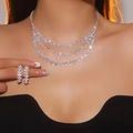 Luxurious silver bridal jewelry set with sparkling floral crystals and fringe necklace - Three-Layer Tassel Pave Style (DTN14027360S)