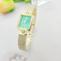 Luxury gold-tone women's quartz watch with turquoise rectangular dial and diamond-set band - Gold Green