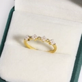 Close-up of gold flower ring with small pearls and clear zircons in a jewelry box - Flower Pearl Style (Gold 1)