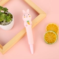 Pink rabbit stress relief gel pen with slow rebound material and carrot detail - Rabbit Holding Carrot