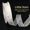 2.5cm wide semi-transparent white chiffon ribbon with gold star print for gift wrapping - Gold Stamped Sheer Small Stars