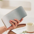 Long clutch wallet for women in gradient grey white with quilted diamond stitching - Gray