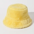 Detailed texture of thick yellow plush faux fur on a warm winter bucket hat - One Size / Light Yellow