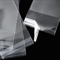 Transparent self-adhesive OPP packaging bags for earrings on a black background - 5x3.5cm Matching Plastic Bags