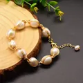 Handmade freshwater pearl bracelet with gold wire wrapping and adjustable lobster clasp - Wire Wrapped Pearl Bracelet