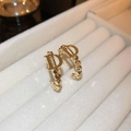 Macro shot of gold-plated D-letter earrings with geometric faceted bead texture - 44# Gold Letter D Shape Open Earrings (44# Silver Earring Post-Gold)