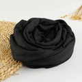 Soft black cotton linen scarf rolled in rose shape on minimalist background - 190x100cm / Black