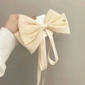 Oversized beige fabric bow hair clip with a small metal butterfly accent for women - White