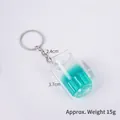 Porte-clés mini chope de bière cocktail vert en résine avec design de 3,7 cm de haut - Cocktail Cyan - Style Porte-clés
