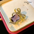 Detailed view of elegant purple gemstone bow brooch with dimensions 2.7cm and 2.2cm - Purple Bowknot Style (B794)