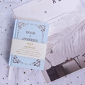 Mini bilingual Book of Answers in light blue hardcover with gold patterns on star gauze - Cherry Blossom Blue