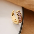 Gold plated ear cuff with pink baguette cut cubic zirconia stones in minimalist style - Pink Gold