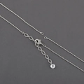 Detail of silver rhodium-plated cross chain with lobster clasp and extension link - Silver Jewelry Chain