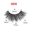 Dense synthetic D1602 false eyelashes with 17mm center length in a premium pink box - Model D1602