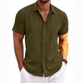 Detail of olive green linen shirt showing lapel collar and button-down texture on model - S / Tops / Olive Green