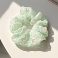 Mint green scrunchie with pink polka dots pattern made of pleated fabric - Turquoise Polka Dot