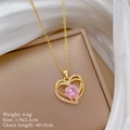 Macro shot of gold heart necklace with pink gem on silk, weight 4.6g, size 1.9x2.1cm - Gold/Pink