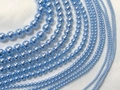 Macro shot of light blue round pearl beads strands in various sizes for DIY jewelry making - Mini / Sky Blue