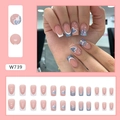 French press-on nails set with blue glitter hearts and nude base design W739 - W739 Heart Glitter