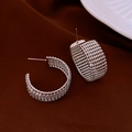 Detailed view of silver C-shaped hoop earrings with intricate metal mesh texture - Silver Mesh Texture C-shaped Style