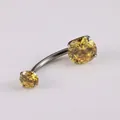 G23 titanium navel ring with double yellow zircon stones and 4-claw setting - Gold Yellow