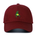 Close-up of a burgundy cotton baseball cap featuring detailed green frog embroidery - Adjustable / Burgundy