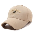 Beige textured baseball cap featuring premium 3D letter embroidery and a curved brim - Medium Beige