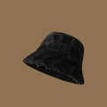 Close-up of soft black faux fur texture on a warm winter bucket hat for women - One Size / Black