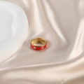 Gold open ring with red enamel finish and sparkling crystal accents on silk background - Red - Zirconia Inlay - Open
