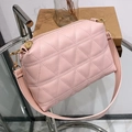 Dusty pink camera bag with triangle quilting and gold hardware on wide strap - Pink