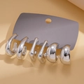 Detail showing 3 pairs of silver C-shaped and geometric stud earrings on display card - Silver (6-Piece Set)