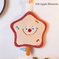 Star-shaped plush hand towel in beige with cute smile embroidery and hanging loop - Apple / Beige