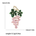 Pink rhinestone grape brooch with gold metal base and green enamel leaves details - Pink