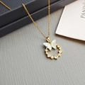 Elegant gold necklace with butterfly pendant and pearl ring on a blue jewelry box - Iridescent Butterfly-Gold Blue 0366JL