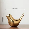 Golden ceramic bird figurine with metallic finish, measuring 7.2cm wide and 6.5cm high - Small / Gold