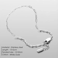 Macro shot of silver stainless steel paperclip chain bracelet with lobster clasp and tag - 15+2cm / White Gold