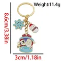Christmas snowman and penguin keychain in gold finish with size and weight dimensions - ER1779-Santa Penguin Snowflake Snowman Keychain