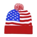 Detailed knit texture of a USA flag beanie with a red and white pompom on top - 56-58cm / Stars and Stripes with Red Brim (E)